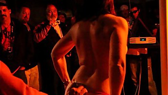 Biker babe strips on pole in Sturgis